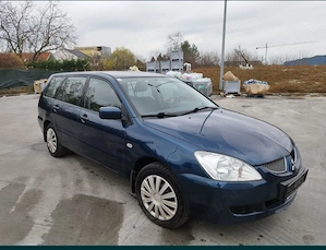 Mitsubishi Lancer Invite Combi 2005, Două mașini, 1600cmc, Benzină 98cp Preț fix= 1.500 - 2.000 Euro