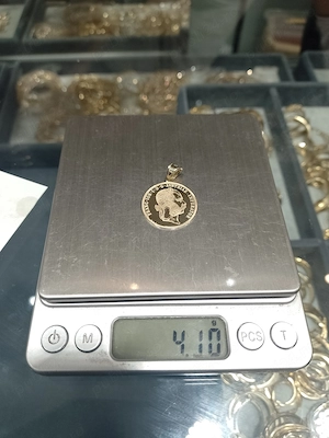 Vânzare bănuț aur 14 k cu 550 gr