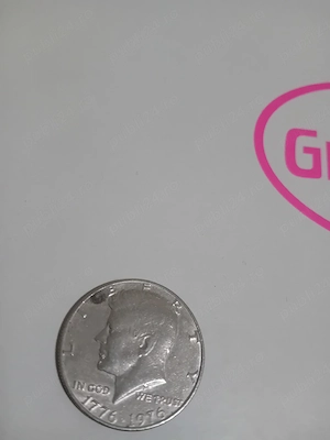 moneda 50 cents SUA anul 1976 in stare foarte bună 