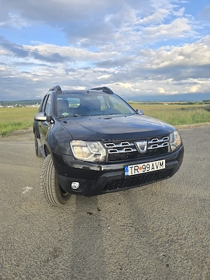 Dacia Duster 1.6 MPI 16V K4M *Editie speciala 10 ani* - imagine 8