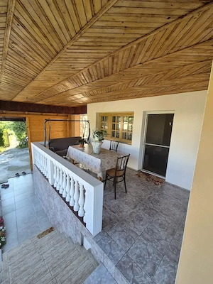 DE VANZARE: Casa la parter, cu garaj, beci si teren generos de 1200 mp - imagine 4
