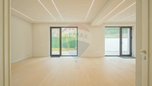 La poalele Tâmpei — vilă contemporană în Schei - imagine 11