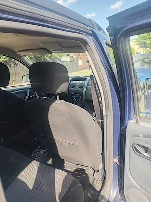Dacia Duster 1,5 dci 4x4 cu pachet de drumuri grele - imagine 5