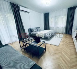 Unirii-Bld. Unirii-Tribunal-studio complet renovat-bloc mixt stradal