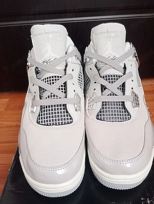 Jordan 4 Frozen Moments 