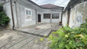 Casa cu teren de 915 mp și front de 20 ml