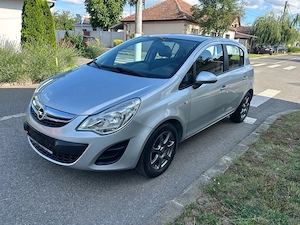 Opel Corsa 1.2 Benzina 85 Cp an 2012 - imagine 3
