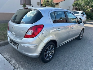 Opel Corsa 1.2 Benzina 85 Cp an 2012 - imagine 4