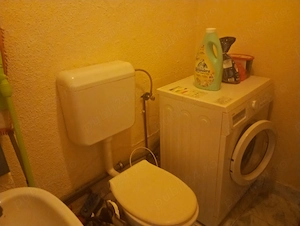 Apartament cu 3 camere,decomandat,parter - imagine 2