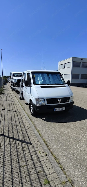 Transport masini pe platforma Germania,Olanda,Romania