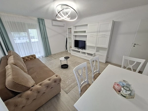 Inchiriez apartament 2 c in Top City mobilat-utilat complet, cu parcare