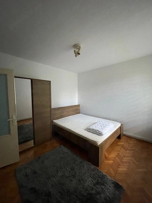 De inchirierat apartament cu doua camere situat la Parter, zona Cornisa, aproape de facultateaUMFST  - imagine 6