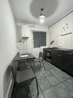 De inchirierat apartament cu doua camere situat la Parter, zona Cornisa, aproape de facultateaUMFST  - imagine 8