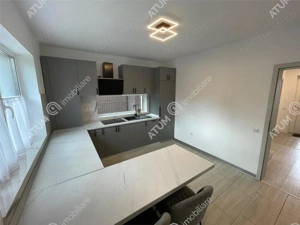 Casa cu 4 camere decomandate si curte libera 180 mp in Selimbar - imagine 10