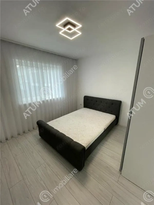 Casa cu 4 camere decomandate si curte libera 180 mp in Selimbar - imagine 4