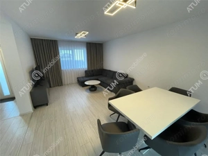 Casa cu 4 camere decomandate si curte libera 180 mp in Selimbar - imagine 2