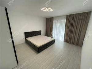 Casa cu 4 camere decomandate si curte libera 180 mp in Selimbar - imagine 5