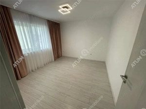 Casa cu 4 camere decomandate si curte libera 180 mp in Selimbar - imagine 6