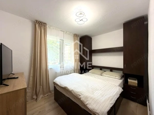 Apartament cu 3 camere, etaj 1/4, decomandat - Cetate  - imagine 2