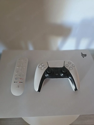 PlayStation 5 + accesorii + 4 jocuri