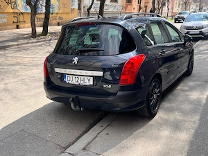 Peugeot 308 SW din 2009 arătos şi sigur - imagine 2