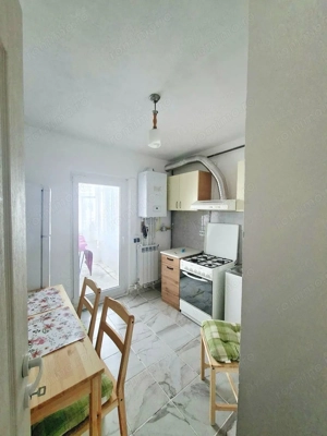 De inchiriat apartament 2 camere, Piața Centrală, et. 4, renovat, 450 eur - imagine 8