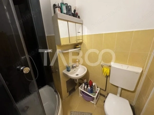 COMISION 0 - Apartament cu 4 camere 2 bai pivnta si balcon Cisnadie - imagine 13