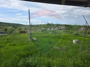 Casă la roșu cu teren mare, cadru natural deosebit Iernut-Mures - imagine 12