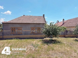Casă în Secusigiu cu teren 1459 mp, fs.20 ml, 4 camere +anexe
