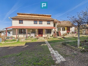 Casă cu 6 camere pe teren de 2029 mp – Miniş - imagine 2