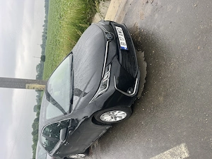 Toyota Corolla Hybrid an 2022 cu Raport Car Vertical 