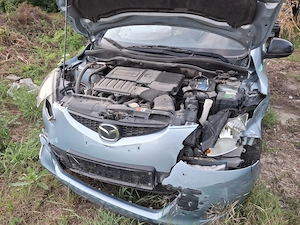 Dezmembrez Mazda 2 . 1.3 benzina  - imagine 3