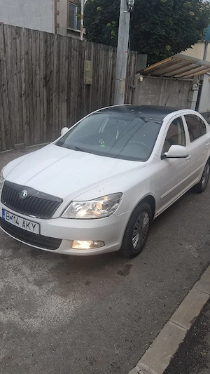 vând SKODA Octavia 2 fl an 2011 pe gaz și benzină