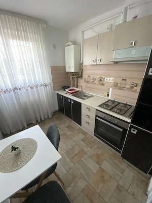 Închiriez apartament 2 camere - imagine 2