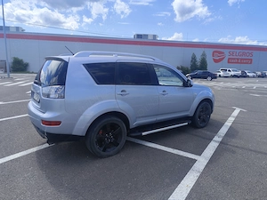 Mitsubishi Outlander II 2.0 DID 140 CP 4x4 7 LOCURI - imagine 5