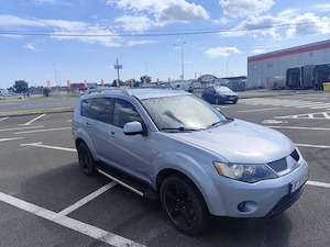 Mitsubishi Outlander II 2.0 DID 140 CP 4x4 7 LOCURI - imagine 4