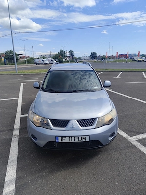 Mitsubishi Outlander II 2.0 DID 140 CP 4x4 7 LOCURI - imagine 8