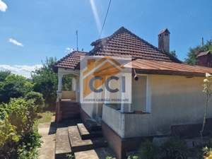 Casa in mediu rural cu teren - imagine 4