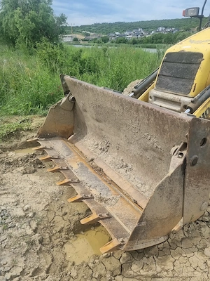 Buldoexcavator New Holland 2007 - imagine 4