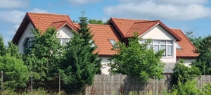 Casă de 200 mp cu teren generos de 1.600 mp