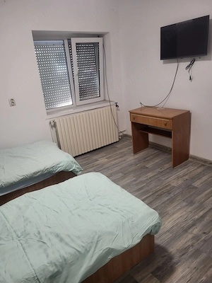 Închiriez casă cu 4 camere  2 bai - imagine 12
