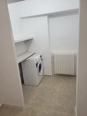 Închiriez casă cu 4 camere  2 bai - imagine 4