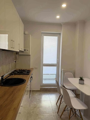 Ofer spre închiriere apartament cu doua camere  - imagine 5