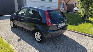 FORD FIESTA 2006 , 1.25 BENZINA, 5 USI,clima,geamuri electrice, computer de bord, roti iarna si vara - imagine 4
