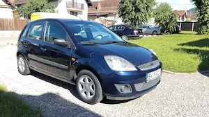 FORD FIESTA 2006 , 1.25 BENZINA, 5 USI,clima,geamuri electrice, computer de bord, roti iarna si vara - imagine 2