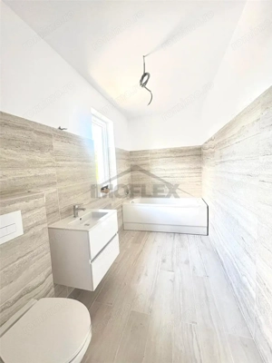 Casa modera cu 3 dormitoare - imagine 2