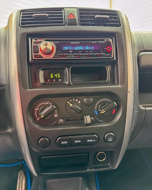 SUZUKI JIMNY 1,3 Benzina . 86 Cp . 4x4 la buton . Garantie 12 luni . Buy-Back . Test-Drive . Livrare - imagine 8