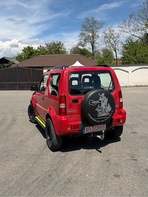 Suzuki Jimny 1.3 Benzină 4x4   20    - imagine 4