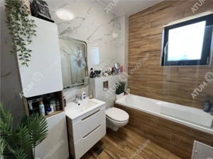 Apartament cu 3 camere si gradina proprie de 85 mp zona Brana - imagine 9