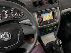 Skoda Octavia 2 facelift 1.2 TSI Ambiente - imagine 4
